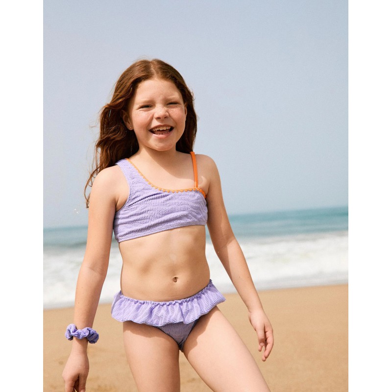 BIKINI NIÑA ASIMEMTRICO VOLANTES + COLETERO LILA