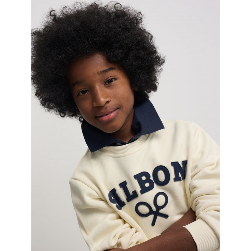 Sudadera blanca cruda de cuello redondo con texto Silbon y raquetas en relieve azul marino para niño Silbon CHIC & Kid